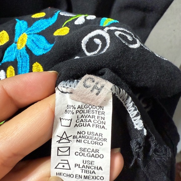 Embroidered Black Top with Floral Design - Picture 2 of 3